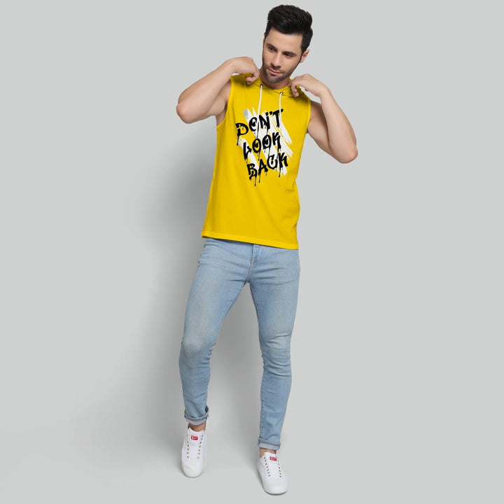 Juxar men's yellow dry-fit hoodie sando with black text slogan paired with light blue jeans and white sneakers