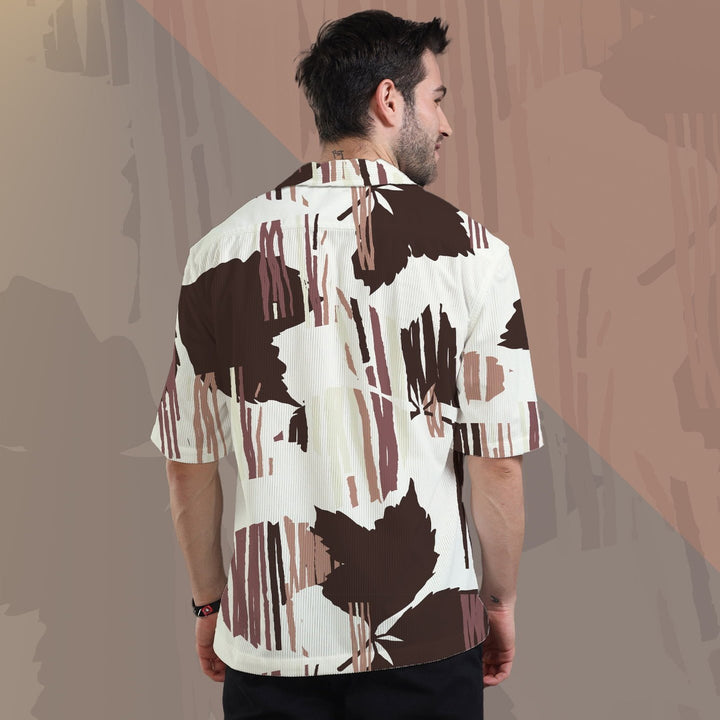 Juxar oversized corduroy shirt for men with abstract brown leaf print on a white background