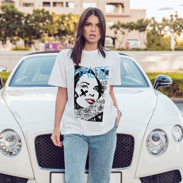 Juxar white graphic vintage boyfriend t shirt on model with pop art face print styled with jeans