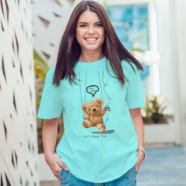 Juxar loose fit boyfriend style t shirt turquoise tee with teddy bear graphic worn by smiling woman for casual everyday look