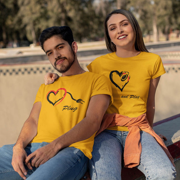 Juxar custom printed couple t shirt yellow matching heart plug design worn by smiling outdoor pair