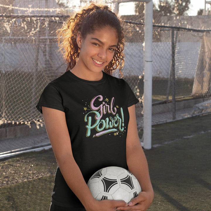 Juxar custom printed t shirt for girl black Girl Power design worn by smiling girl holding soccer ball