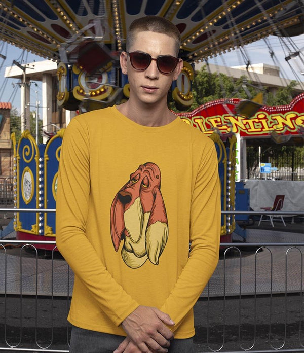Man wearing mustard designer cotton long sleeve t shirt with droopy dog print at amusement park