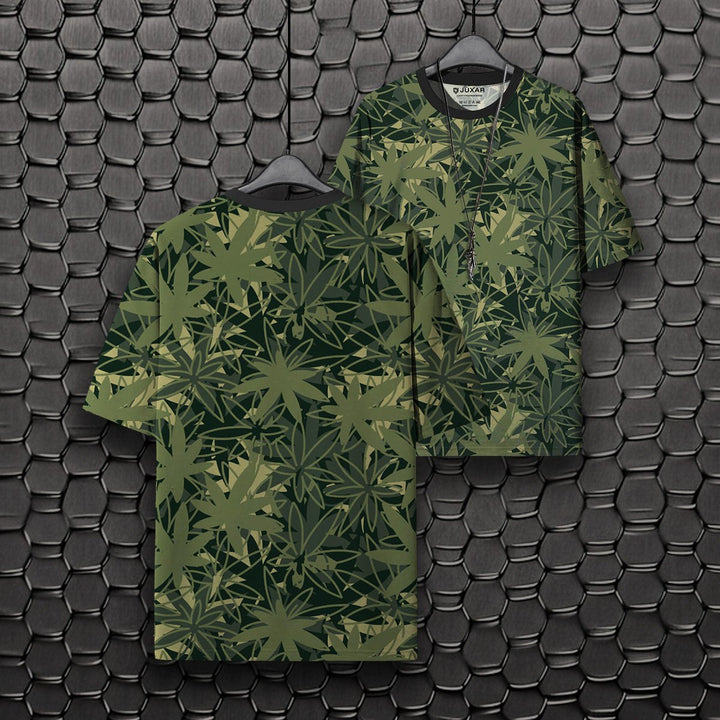 Mens oversized green leaf print t shirt front and back on hangers on hex tile background oversized printed t shirt outfit ideas