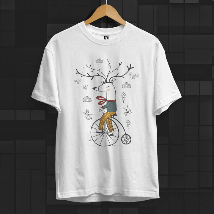 Juxar girls T shirt with winter deer graphic t-shirt showing a whimsical deer on a unicycle wearing a scarf