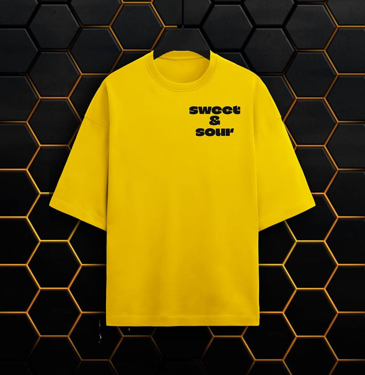 Juxar yellow oversized sweet and sour graphic t-shirt with black text on front